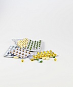 Close-up of pills pack on white background