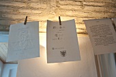 Low angle view of handmade papers hanged for dry, Augsburg, Bavaria, Germany