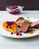 Saddle of venison with caramelised pears