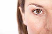 Close-up of woman's brown eye