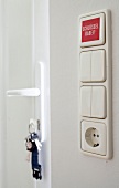 Close-up of white light switches