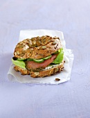 Salmon bagel on napkin