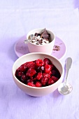 Bowl of cherry and raspberry compote, low GI diet food