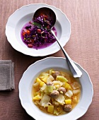Red cabbage and barley stew with cabbage stew on plates