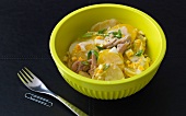 Potato salad with egg and smoked mackerel in bowl