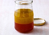 Close-up of fruity vinaigrette in jar