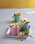 Cups of quark pudding with currants on plate