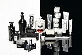 Close-up of cosmetic products on black and white background