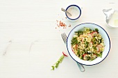 Bulgur salad with radishes in bowl
