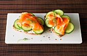 Bread with horseradish and salmon on board