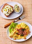 Toast bread with egg, chive cream and shrimps on plate