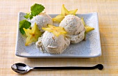 Carambola tofu ice-cream garnished with flower and herb on tray