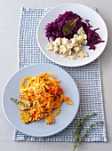 Red cabbage with mushroom ragout and millet with tomatoes and cucumbers on plate