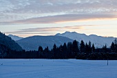 View of snow mountains at sunset in winter at Leutaschtal, North Tyrol, Italy