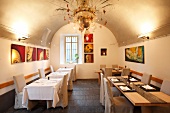Tables laid in La Sorgente Restaurant, Morcote, Ticino, Switzerland