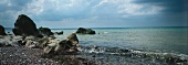 View of eroded rocks on beach in Brittany, France