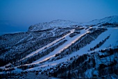 View of snow mountain and Hemsedal ski resort at dusk in Norway