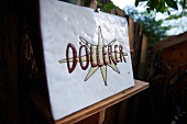 Namensschild von Döllerers Genießer- hotel, Golling, Salzburger Land