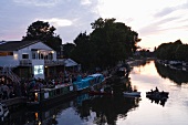 View of  Stamford Hill, Floating Cinema and river Lee in East End at dusk, London, UK