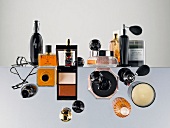 Various cosmetic products and perfumes on glass