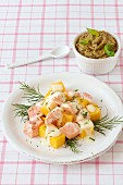 Salmon salad with mango served with a sardine dip with basil