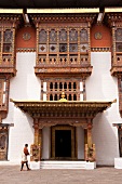 Monks in courtyard of Punakha monastery, Bhutan