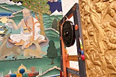 Punakha Dzong with mural painting depicting monk, Bhutan
