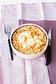 Gratinated millet bake with carrots and parsnips with Romadur cheese