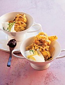 Tagliatelle pasta with poppy seeds in ceramic bowls