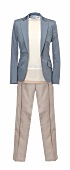 Grey cotton blazer, pants and cotton shirt in layered look on white background