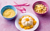 Various snacks for babies in bowls