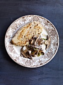 Turkey cutlets with mushrooms on plate