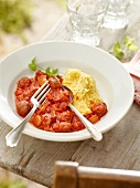 Casserole with sausage and fennel on plate