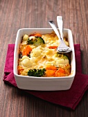 Baked quinoa and vegetables in baking dish