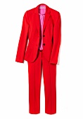 Red jersey suit with pink silk blouse on white background