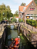 View of Cafe 't Sluisje and Sluice Channel, Noord, Amsterdam, Netherlands