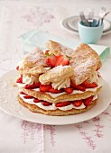 A puff pastry cake with strawberries and cream