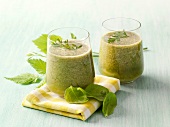 Glasses of sweet green smoothies
