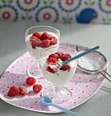 Quark cream with raspberries in glass
