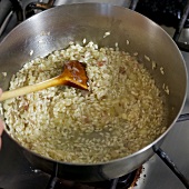 Close-up of risotto being sauteed in pan, step 2