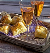 Herbal cheese pastries on wicker tray