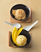 Sesame soy ice-cream and lactose-free mango ice-cream in bowls