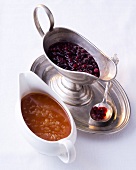 Cranberry and rosehip sauce in sauce boats