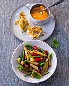 Fennel and carrots puree in bowl and ratatouille on plate