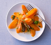 Sweet and sour carrots on plate