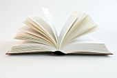 Close-up of open book on white background