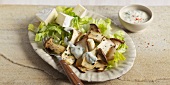 Cheese and mushroom salad in serving dish