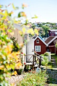 View of wooden boat houses and fishing village at Sweden