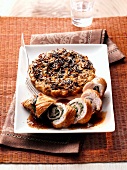 Turkey roulade with wild rice on plate
