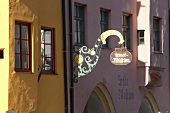 Blue, yellow and pink building in Wasserburg am Inn in Rosenheim, Bavaria, Germany